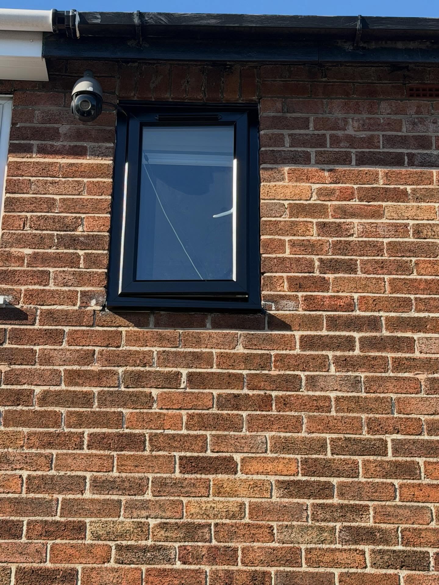 uPVC casement window resprayed anthracite grey with a flawless finish.